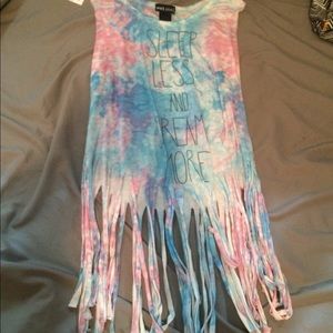 Shirt that’s cropped shows a little tummy.